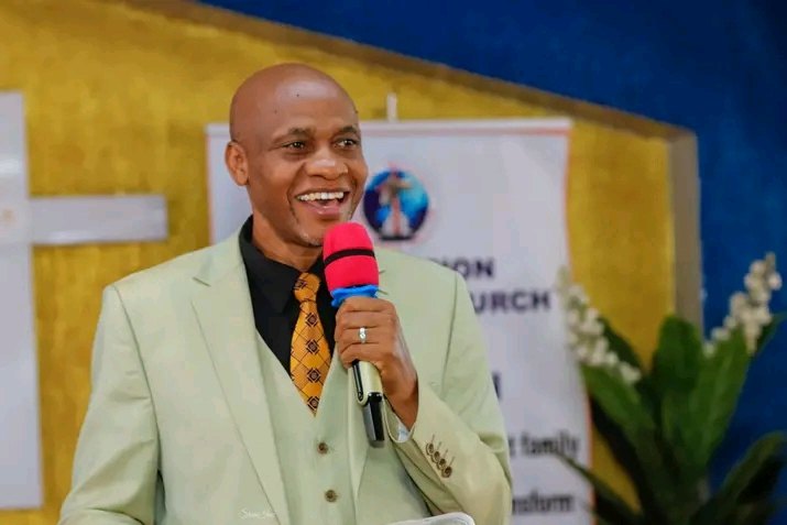 Bishop John Kaberere smiling as he ministers