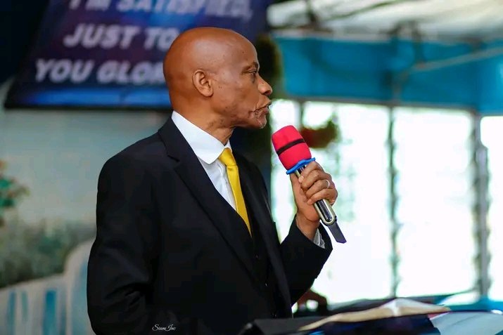 Bishop John Kaberere teaching from the Bible