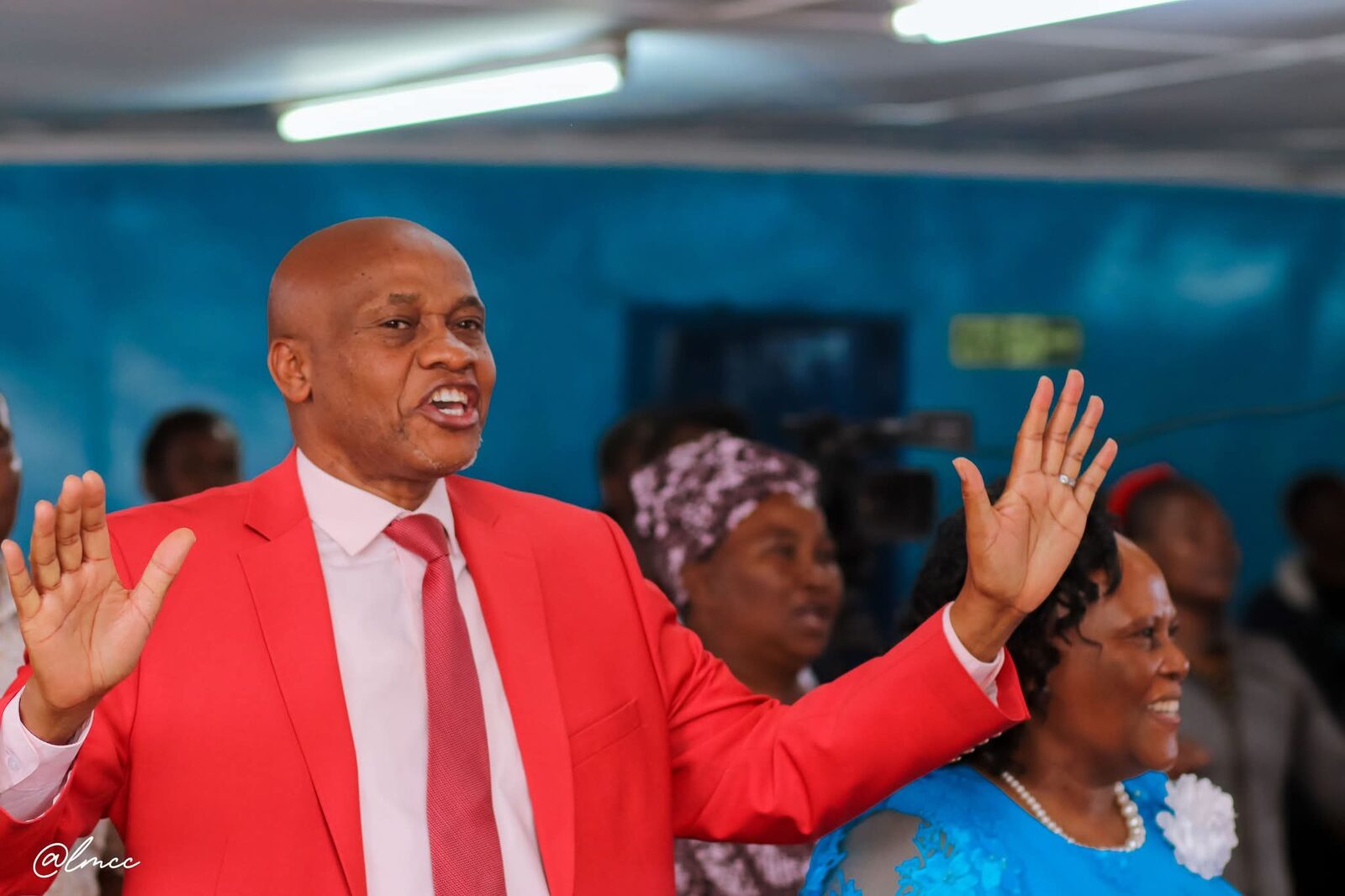 Bishop John Kaberere leading worship